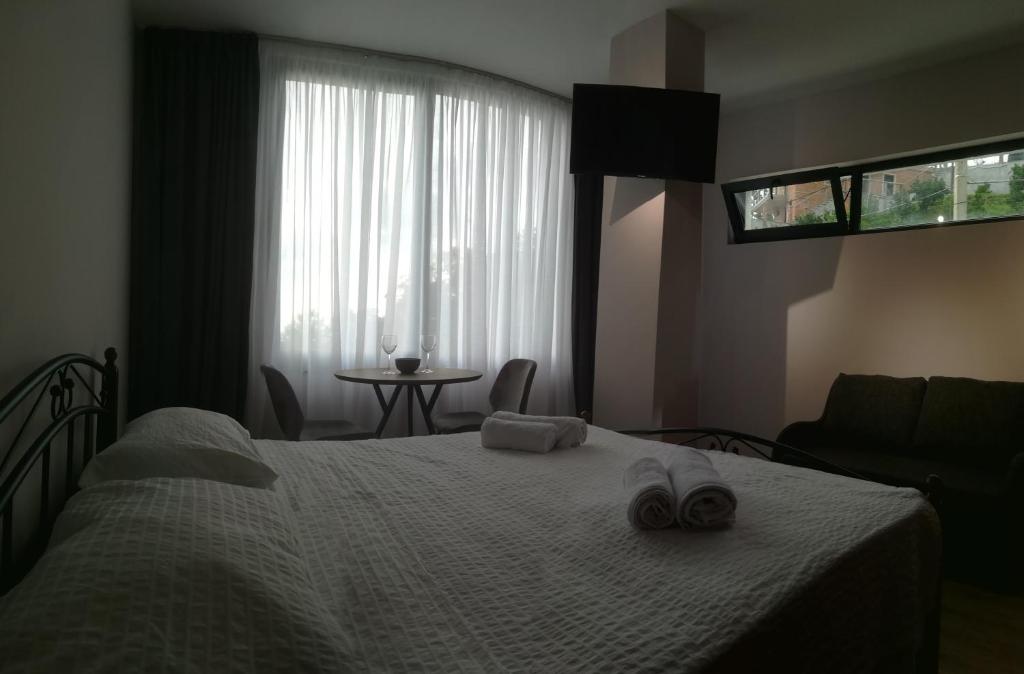 Llit o llits en una habitació de Boutique Hotel Sleep and Wine