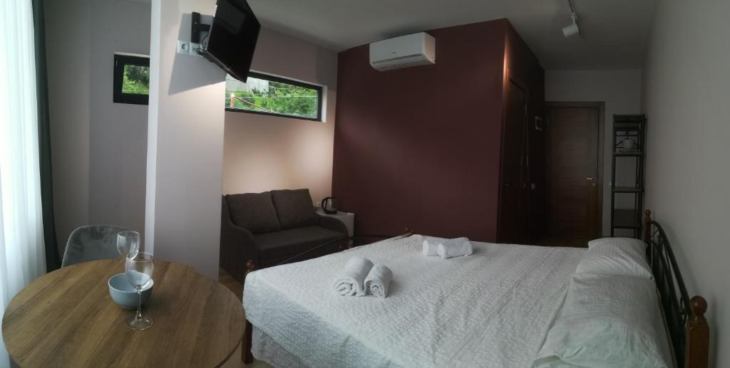Llit o llits en una habitació de Boutique Hotel Sleep and Wine