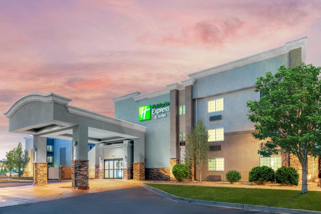 a rendering of a hotel building with a sign at Holiday Inn Express & Suites Wheat Ridge-Denver West, an IHG Hotel in Wheat Ridge