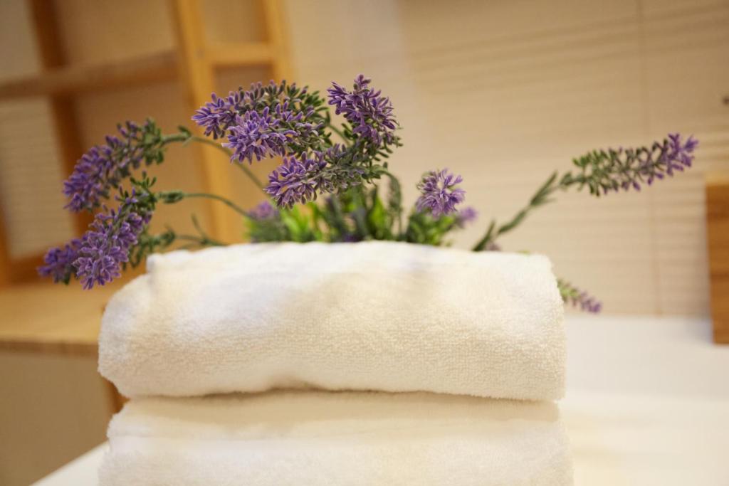 Postel nebo postele na pokoji v ubytování Acqua - Attico con terrazza
