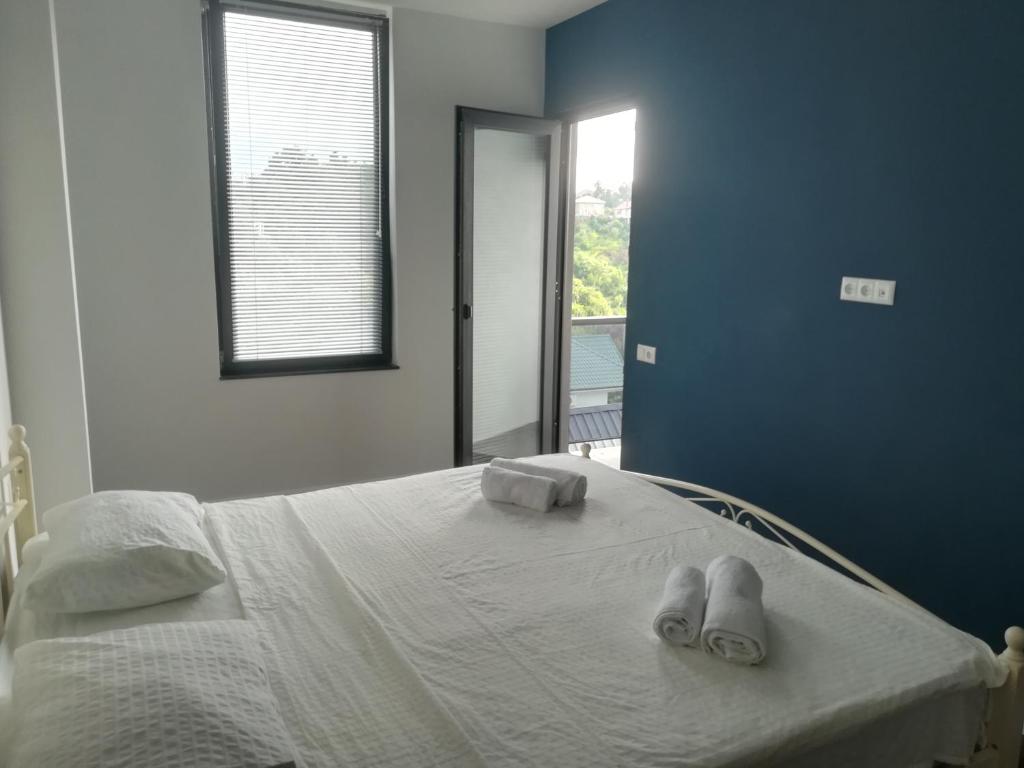 Llit o llits en una habitació de Boutique Hotel Sleep and Wine