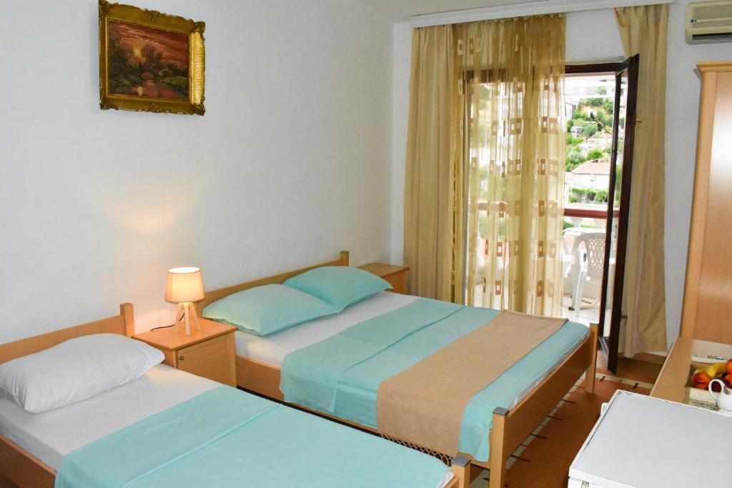 Postel nebo postele na pokoji v ubytování Guesthouse Elsa
