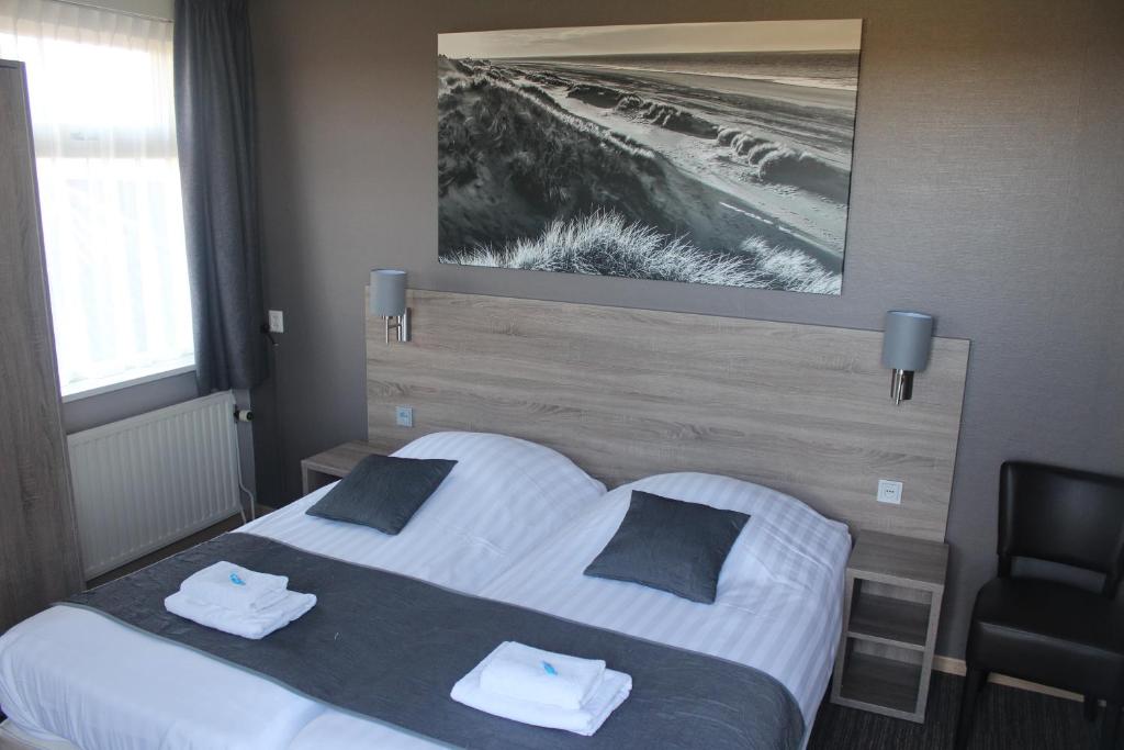 Postel nebo postele na pokoji v ubytování Hotel Restaurant 't Klokje