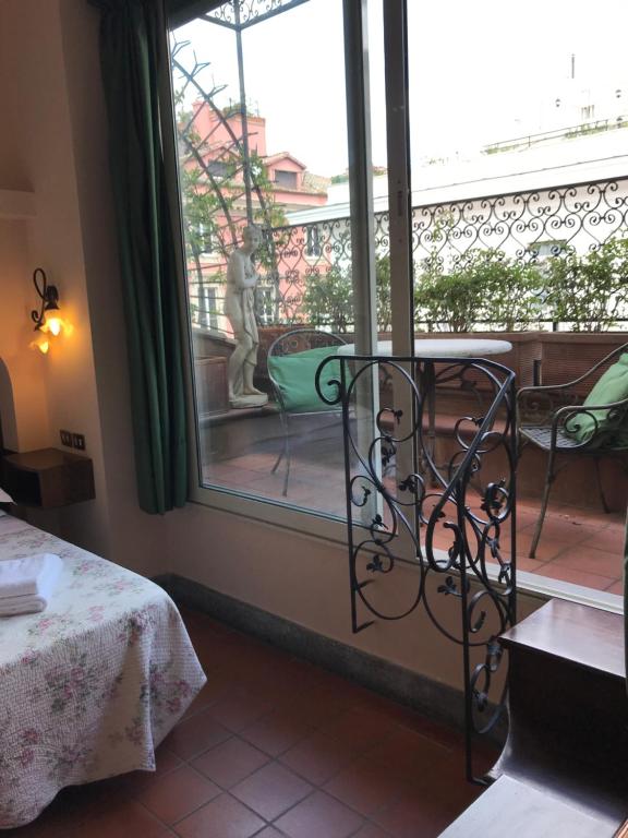Postel nebo postele na pokoji v ubytování Hotel OKAPI