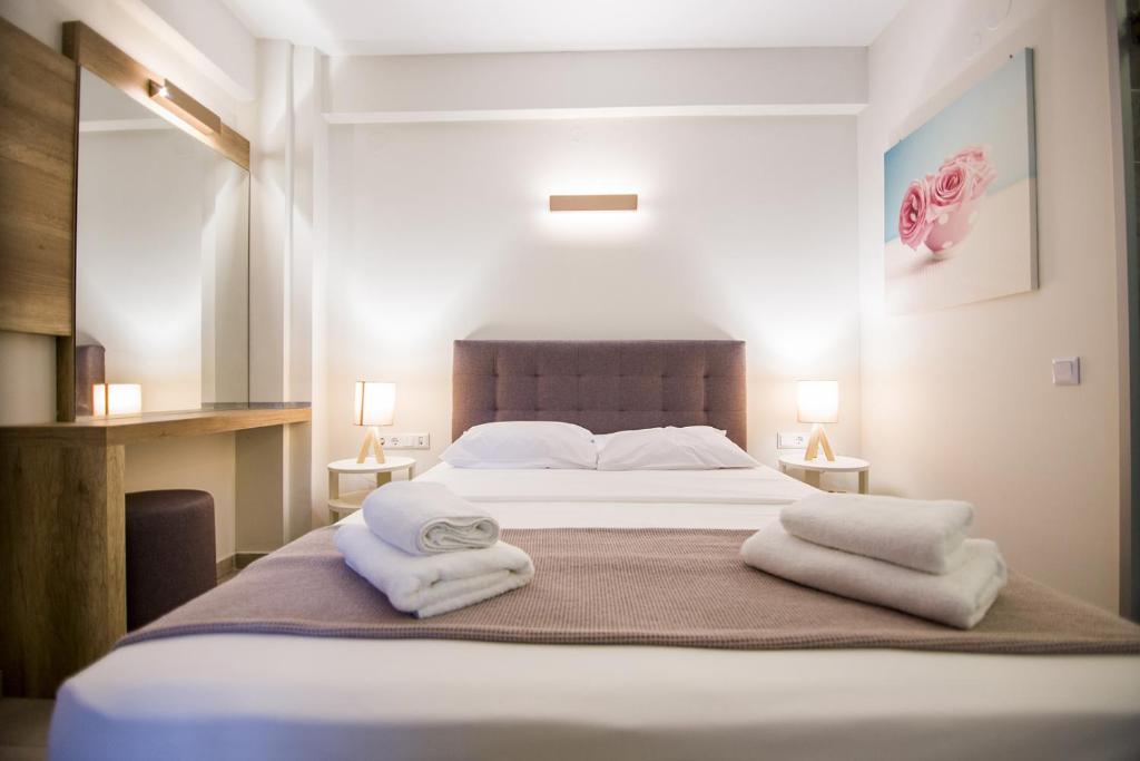 Postel nebo postele na pokoji v ubytování Armonia Resort