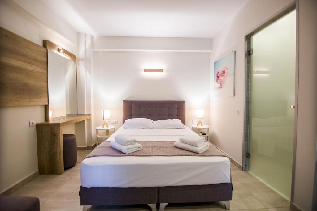 Postel nebo postele na pokoji v ubytování Armonia Resort