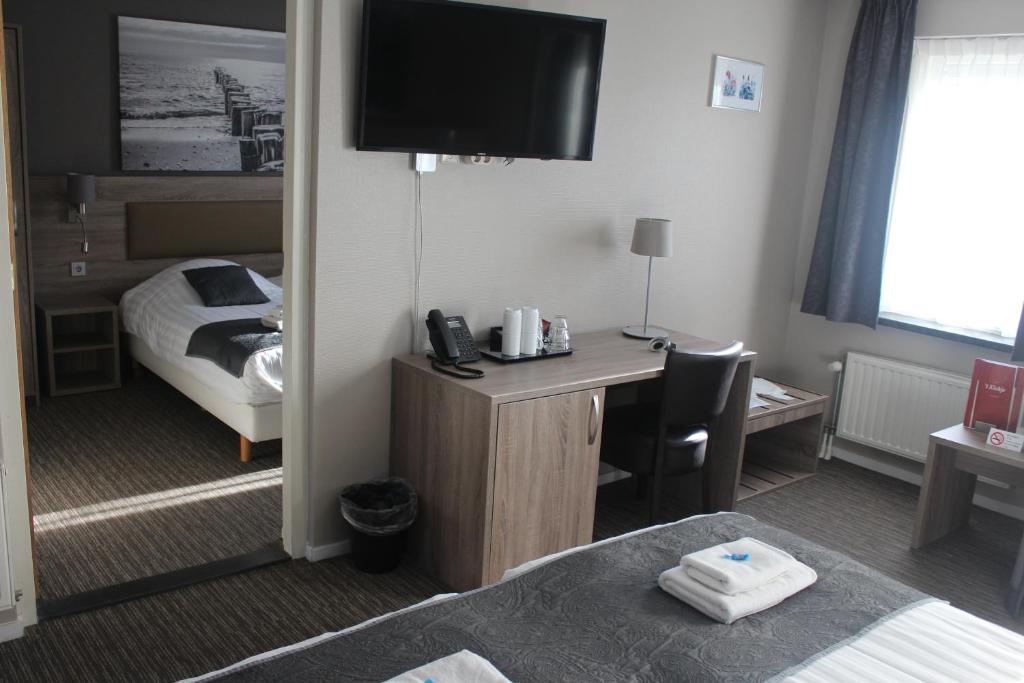 Postel nebo postele na pokoji v ubytování Hotel Restaurant 't Klokje