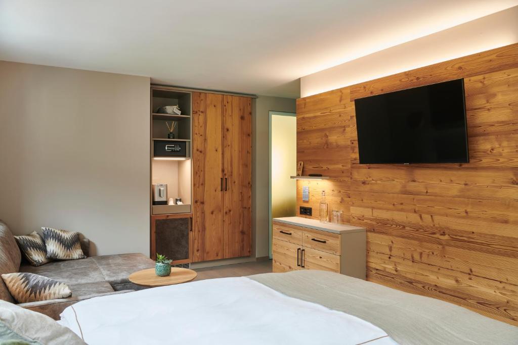 TV a/nebo společenská místnost v ubytování Matthiol Boutique Hotel
