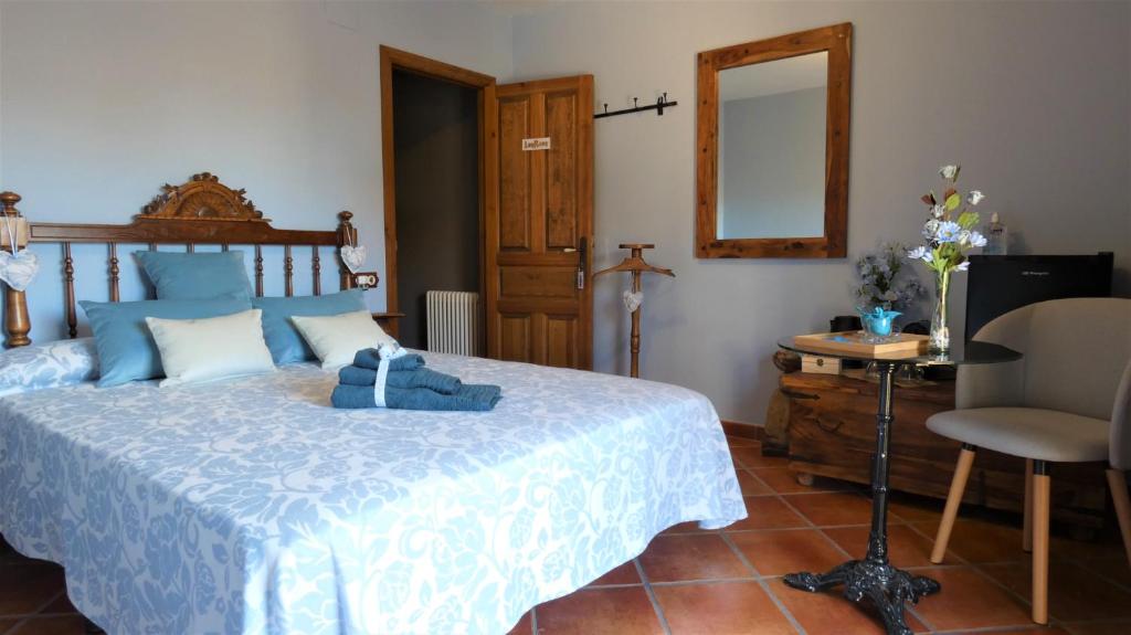 Postel nebo postele na pokoji v ubytování LA POSADA DEL ISABENA