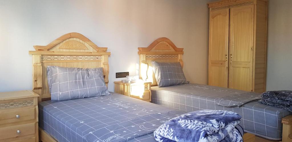 Postel nebo postele na pokoji v ubytování Superbe Appartement bouki