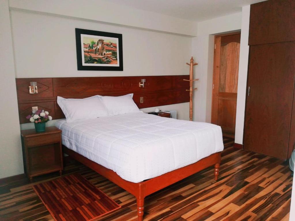 Voodi või voodid majutusasutuse Hotel Daylu toas