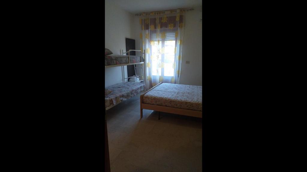Posteľ alebo postele v izbe v ubytovaní Room in BB - Quadruple room for a totally relaxing holiday