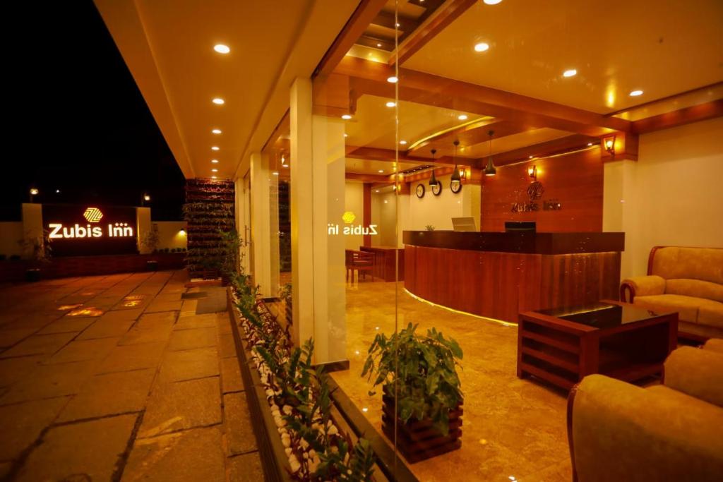 Posezení v ubytování Zubis Inn Hotel