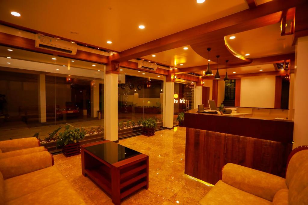 Posezení v ubytování Zubis Inn Hotel