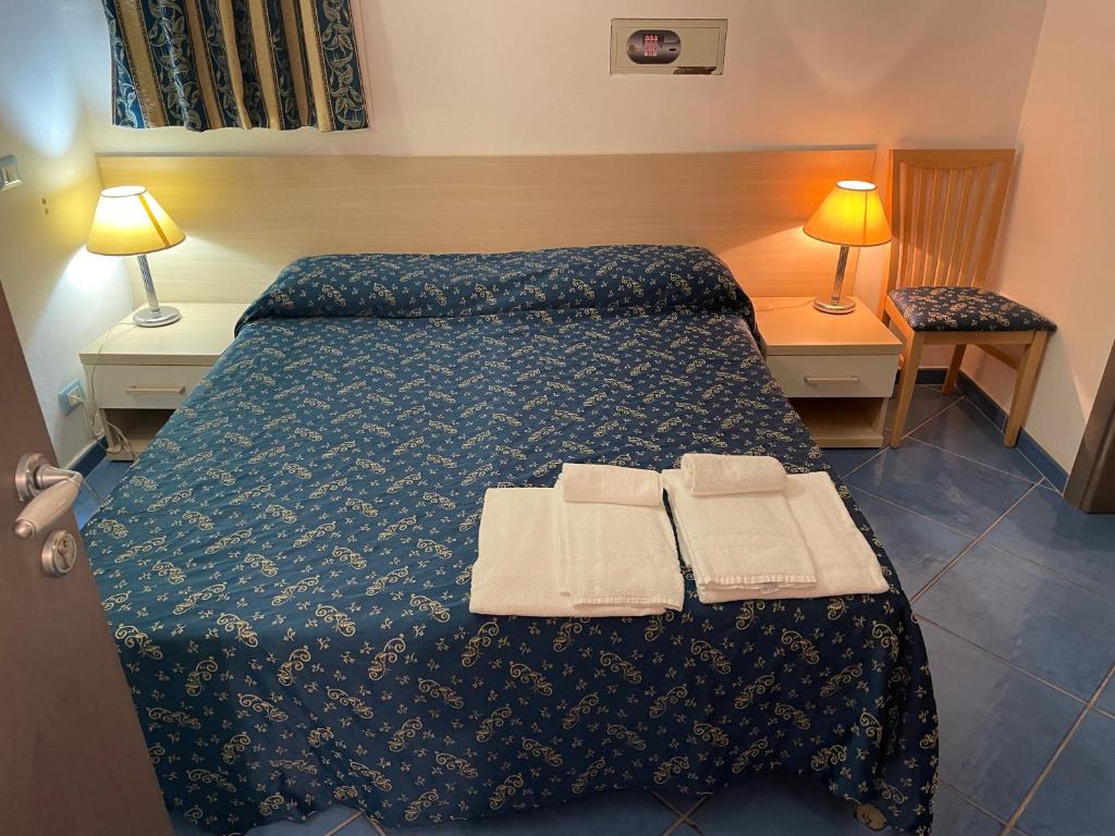 Postel nebo postele na pokoji v ubytování B&B La Terrazza Sul Porto