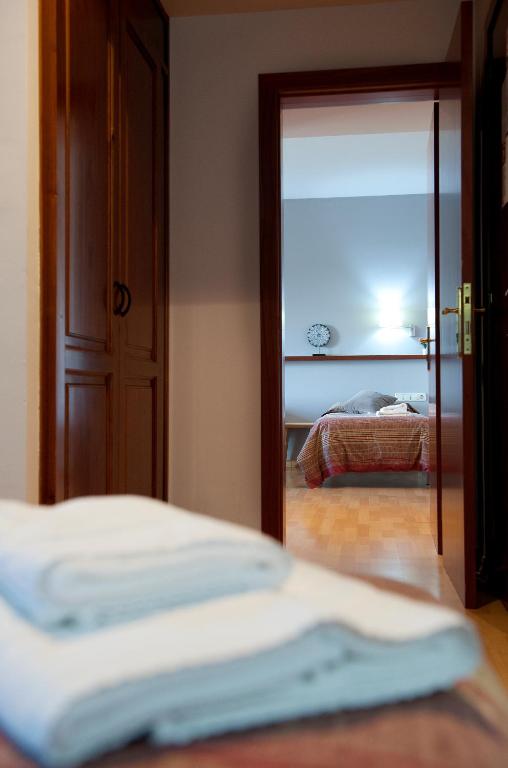 Postel nebo postele na pokoji v ubytování Hotel Seva