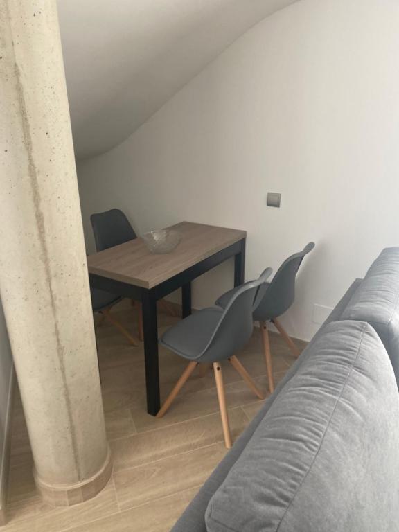 A seating area at Apartamentos Hostería de Boo