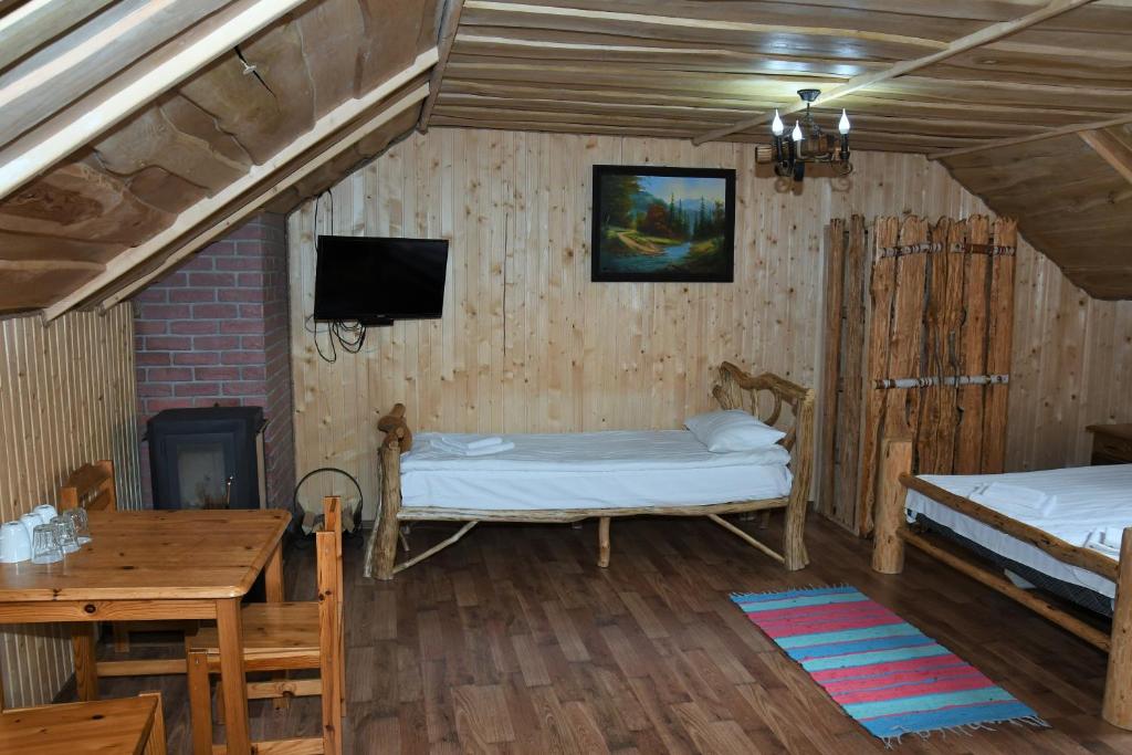 Postel nebo postele na pokoji v ubytování Kisva Hotel