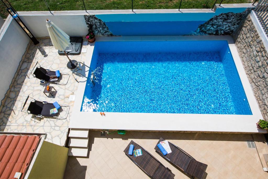 Bazén v ubytování Sunrise Apartments 3 nebo v jeho okolí