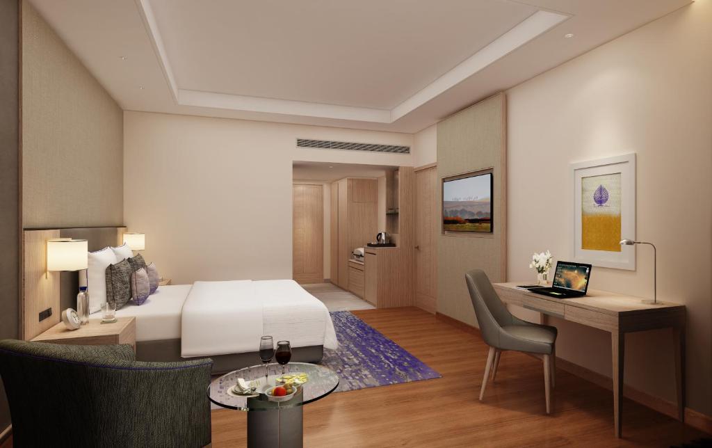 Postel nebo postele na pokoji v ubytování Vivanta Bhubaneswar DN Square