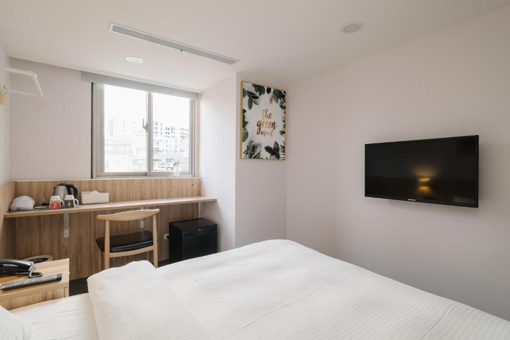 TV a/nebo společenská místnost v ubytování Hotel attic