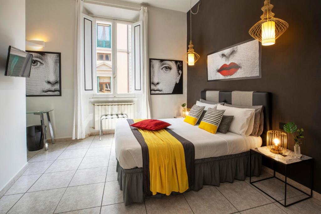 Un pat sau paturi într-o cameră la 3B Bed & Breakfast Firenze Centro