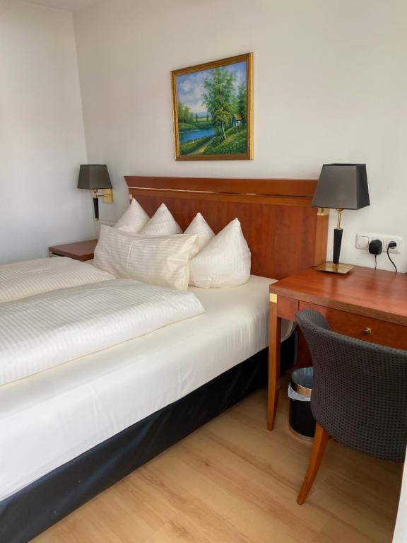 Postel nebo postele na pokoji v ubytování Hotel Condor