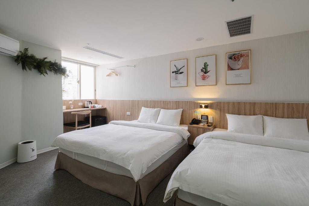 Postel nebo postele na pokoji v ubytování Hotel attic