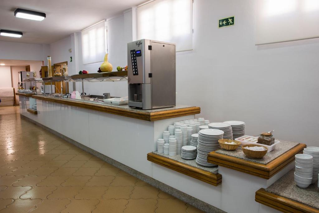 Kuchyň nebo kuchyňský kout v ubytování Hotel Sur