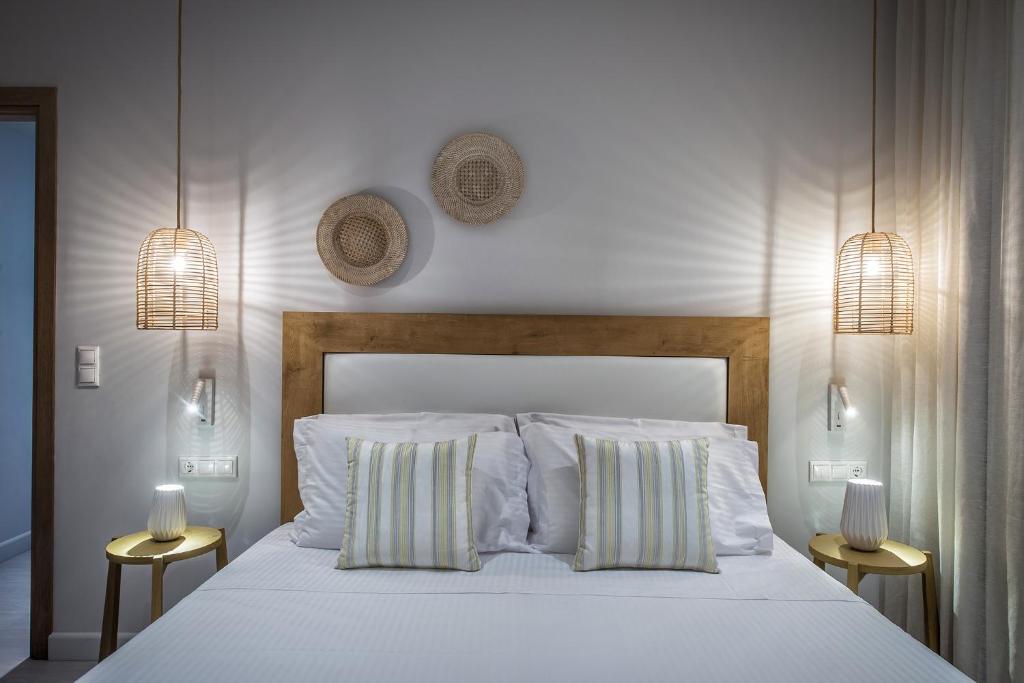 Postel nebo postele na pokoji v ubytování Maritime Suites