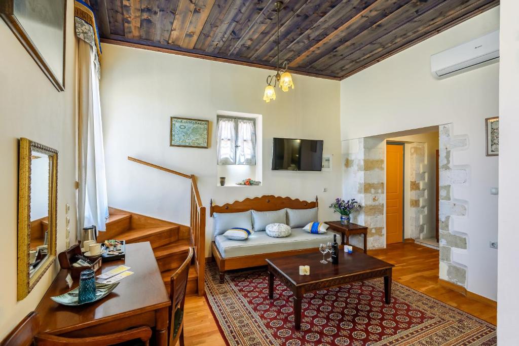 TV a/nebo společenská místnost v ubytování Belmondo Hotel