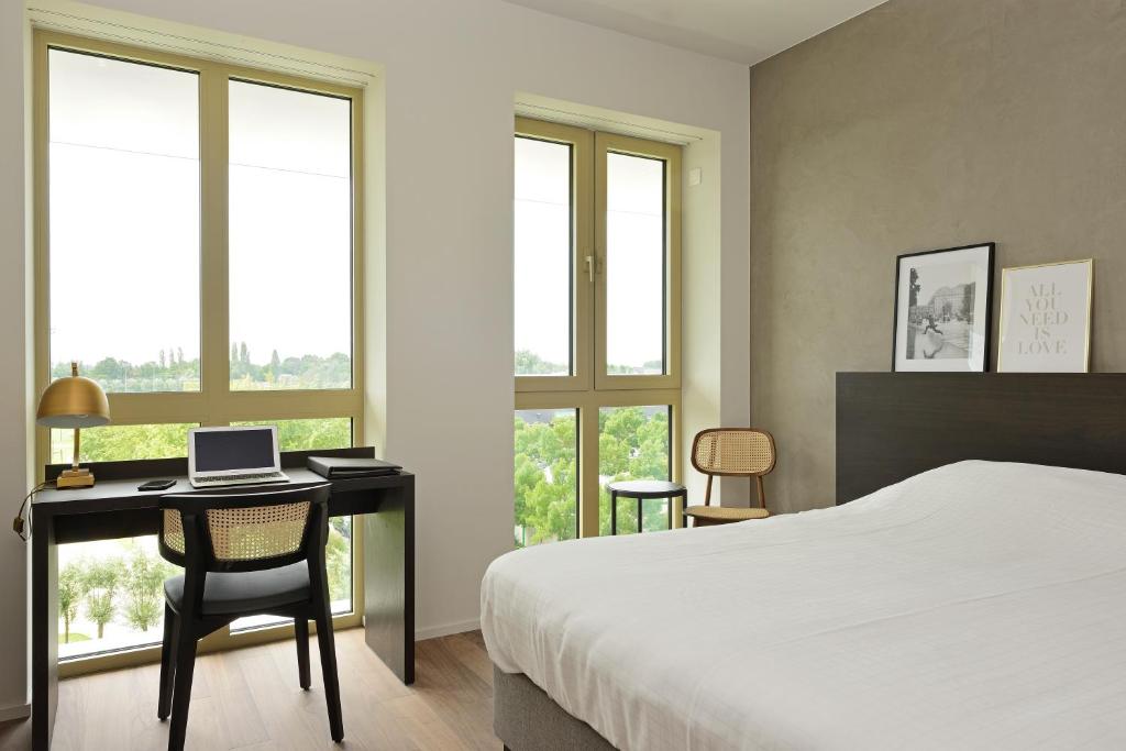 Postel nebo postele na pokoji v ubytování Parkhotel Waregem