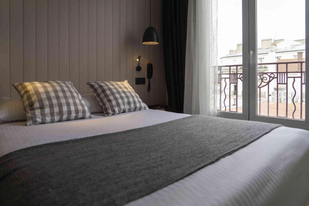 Postel nebo postele na pokoji v ubytování Hotel SUB