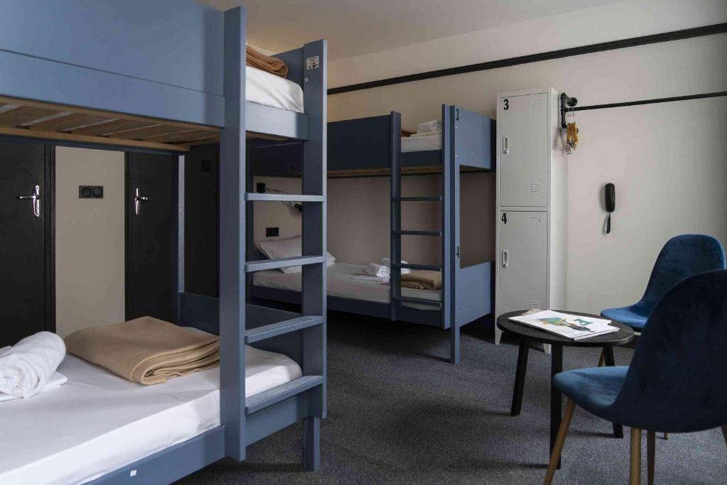 Postel nebo postele na pokoji v ubytování Hotel SUB