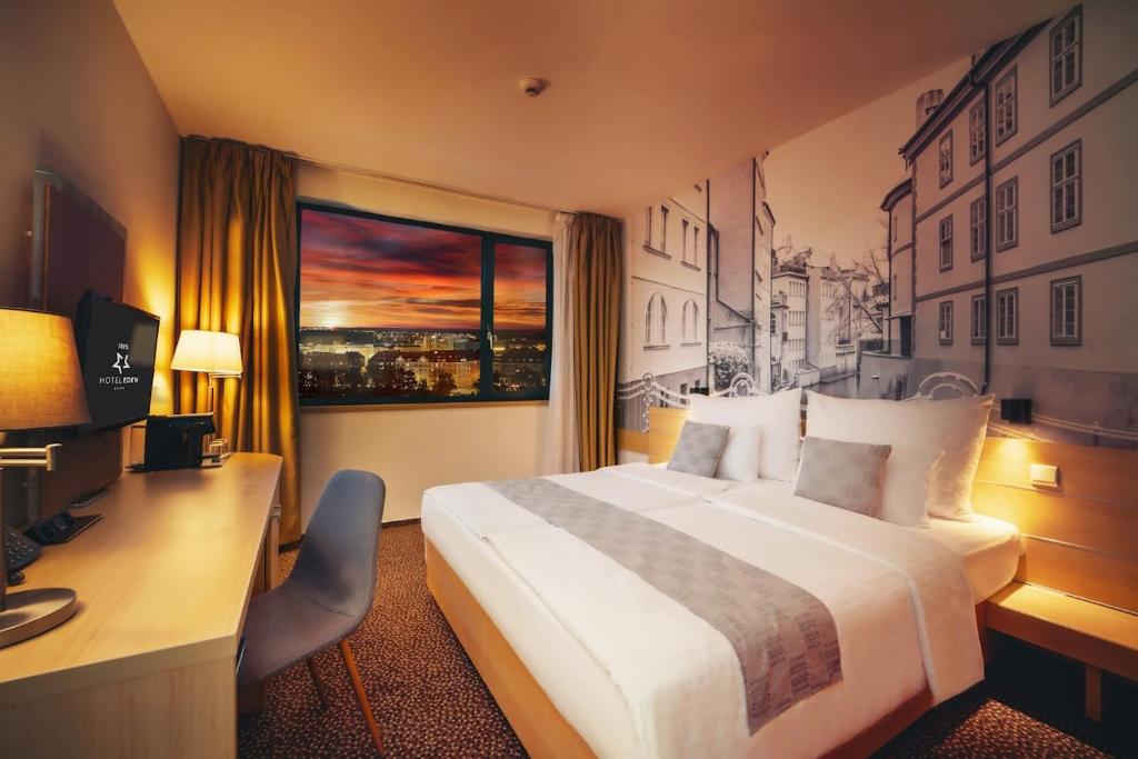 Łóżko lub łóżka w pokoju w obiekcie Iris Hotel Eden - Czech Leading Hotels