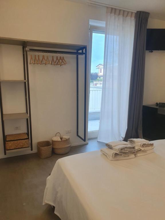 Łóżko lub łóżka w pokoju w obiekcie Casa Lunaria B&B