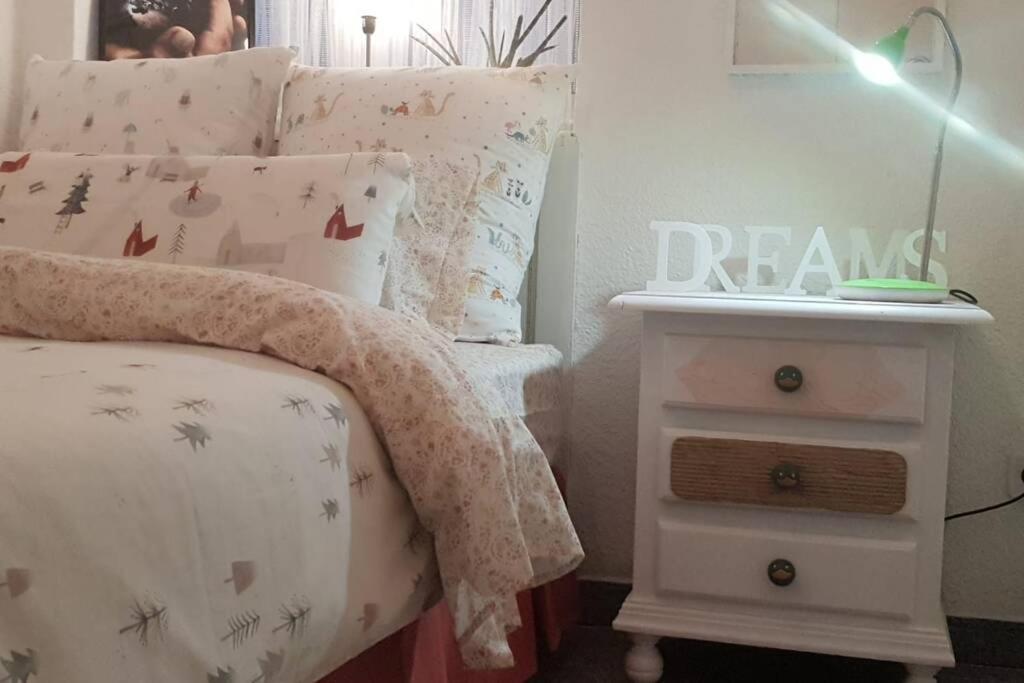 Postel nebo postele na pokoji v ubytování Bonito y coqueto apartamento
