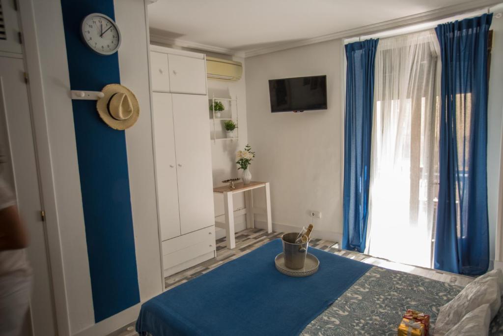 Cama o camas de una habitación en Fuencarral Adeco