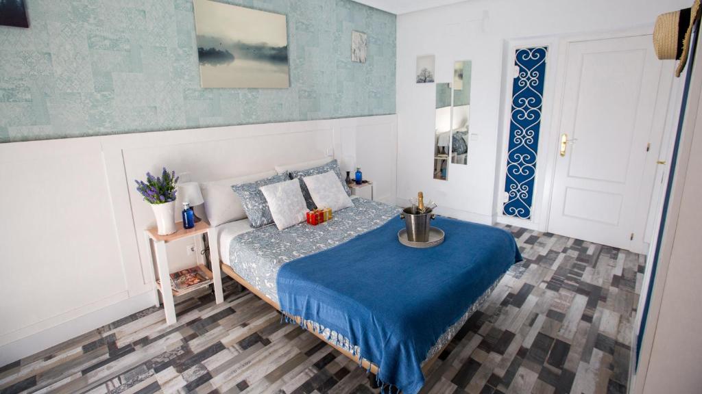 Cama o camas de una habitación en Fuencarral Adeco