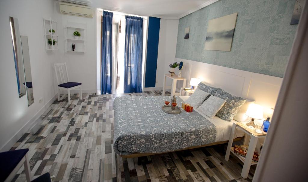 Cama o camas de una habitación en Fuencarral Adeco