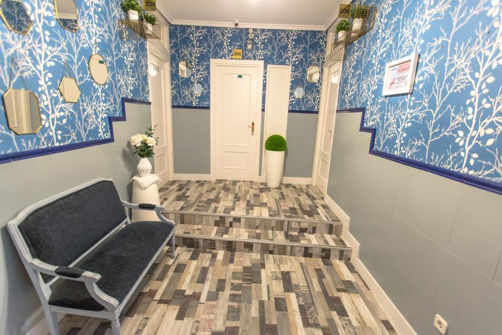 Cama o camas de una habitación en Fuencarral Adeco