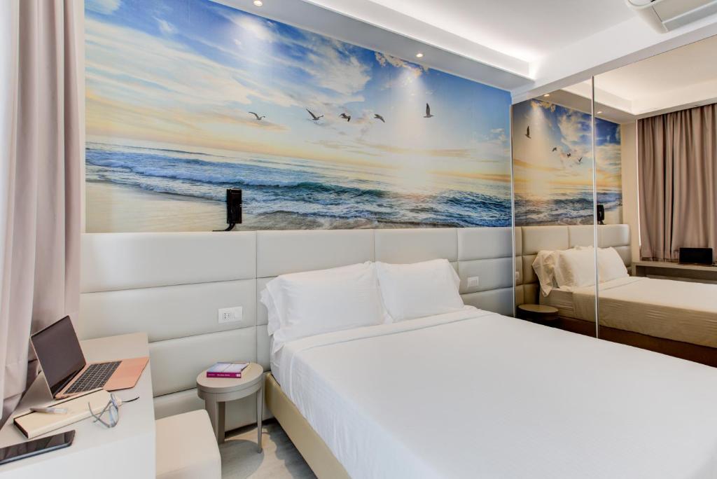 Postel nebo postele na pokoji v ubytování Hotel Sympathy