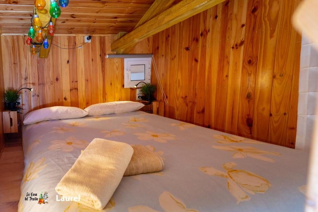 Кровать или кровати в номере La Casa del Druida