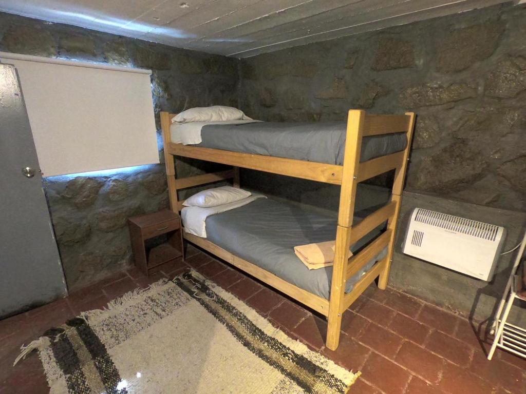 Postel nebo postele na pokoji v ubytování Cordillera Hostel