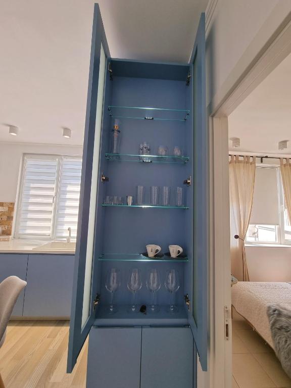 A bed or beds in a room at Snow Sheep apART - апартамент с две спални