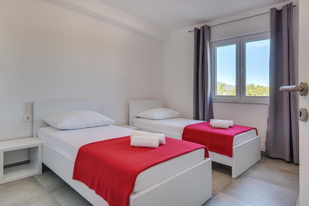 Ein Bett oder Betten in einem Zimmer der Unterkunft Green Point Paklenica