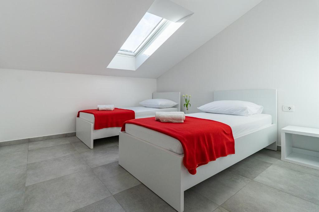 Ein Bett oder Betten in einem Zimmer der Unterkunft Green Point Paklenica