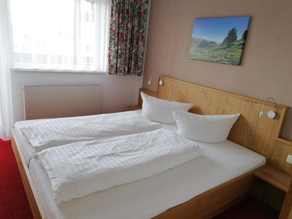 Postel nebo postele na pokoji v ubytování Appartements Rosmarie