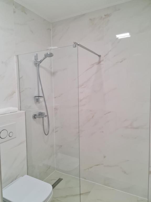 Kúpeľňa v ubytovaní Kolibri Apartman