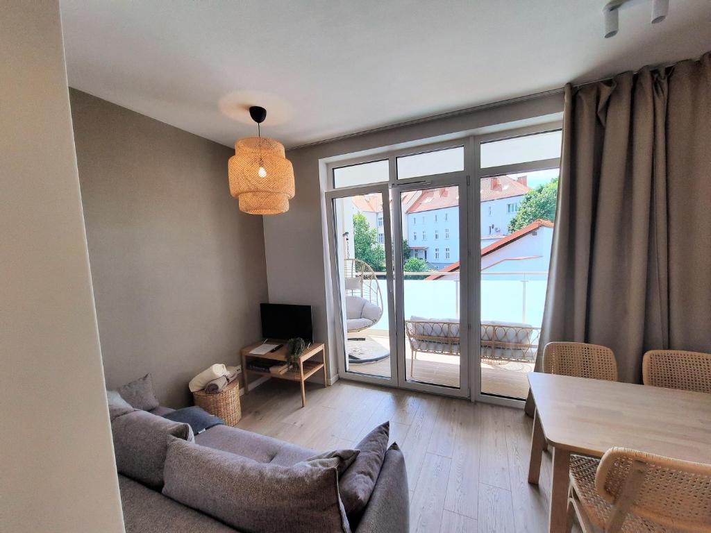 Część wypoczynkowa w obiekcie PLUSK Apartments Mrągowo